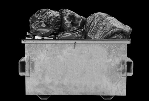 Supervisor recording a site risk assessment on a clipboard