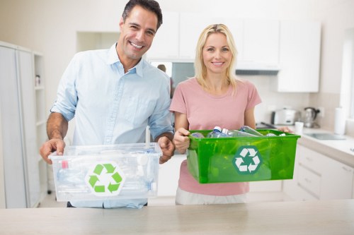 Workers sorting recycling at a local transfer station